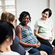 Pregnant women sitting together in a group class.