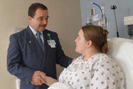 Chaplain comforts patient