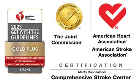 Two badges side by side: Left 2023 Stroke American Heart Association and Right: The Joint Commission American Heart Association 