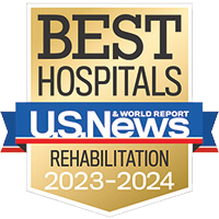 A gold badge with a blue ribbon representing Best Hospitals in Rehabilitation for 2023-2024.