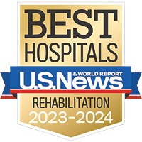 A gold badge with a blue ribbon representing Best Hospitals in Rehabilitation for 2023-2024.