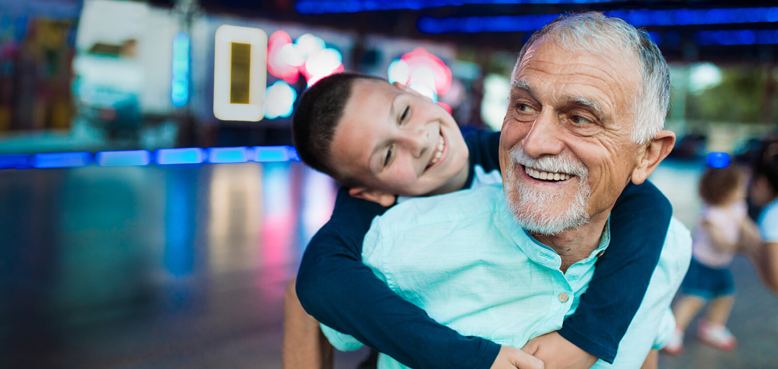 A grandfather and grandson. 