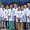 A group of medical professionals smiling at the camera.