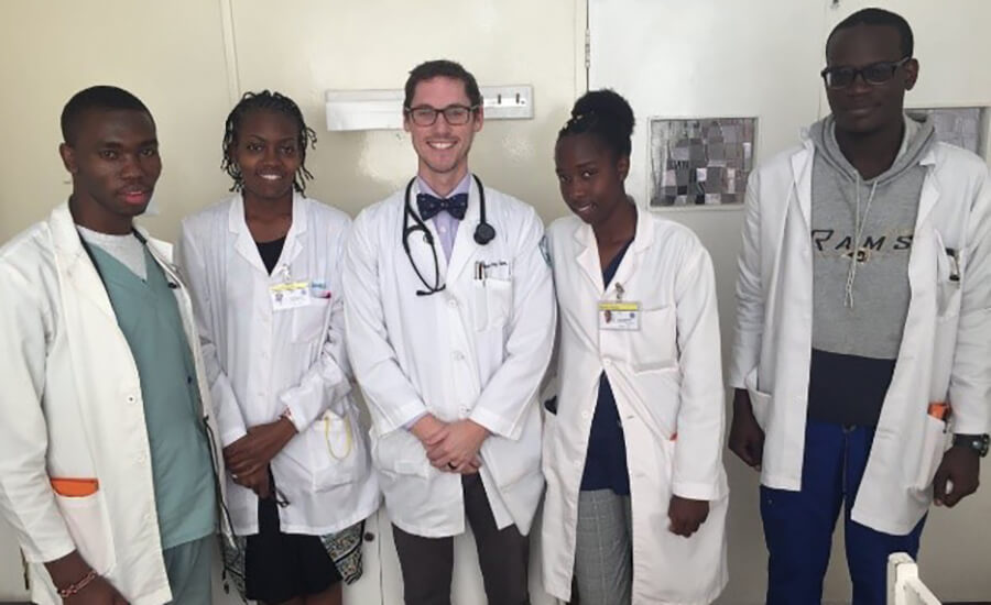 A group of medical professionals smiling at the camera.