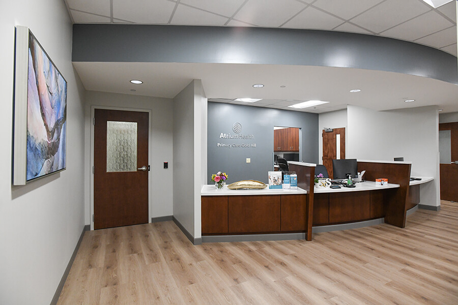 Atrium Health Primary Care Gold Hill reception area supporting subscription health care.