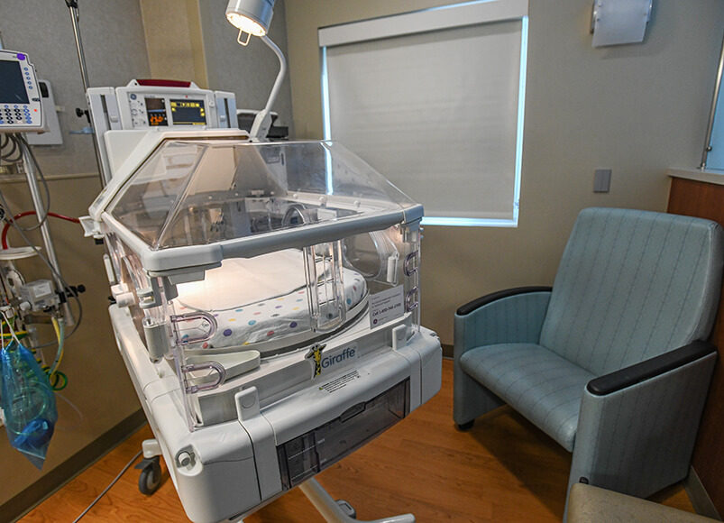 A medical suite equipped with medical and monitoring equipment.