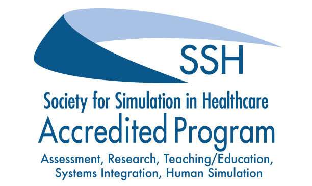 A blue logo for the Society of Simulation in Healthcare recognizing accredited programs in Assessment, research, teaching/education, systems integration and human simulation.