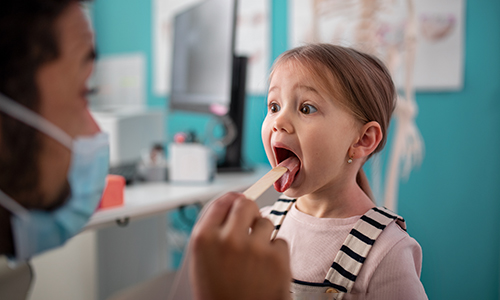 Doctor checking on a patient.