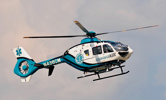 Med Center Air Eurocopter Helicopter in sky