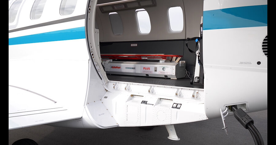 Door open with medical equipment inside Pilatus PC-24 Med Center Airplane