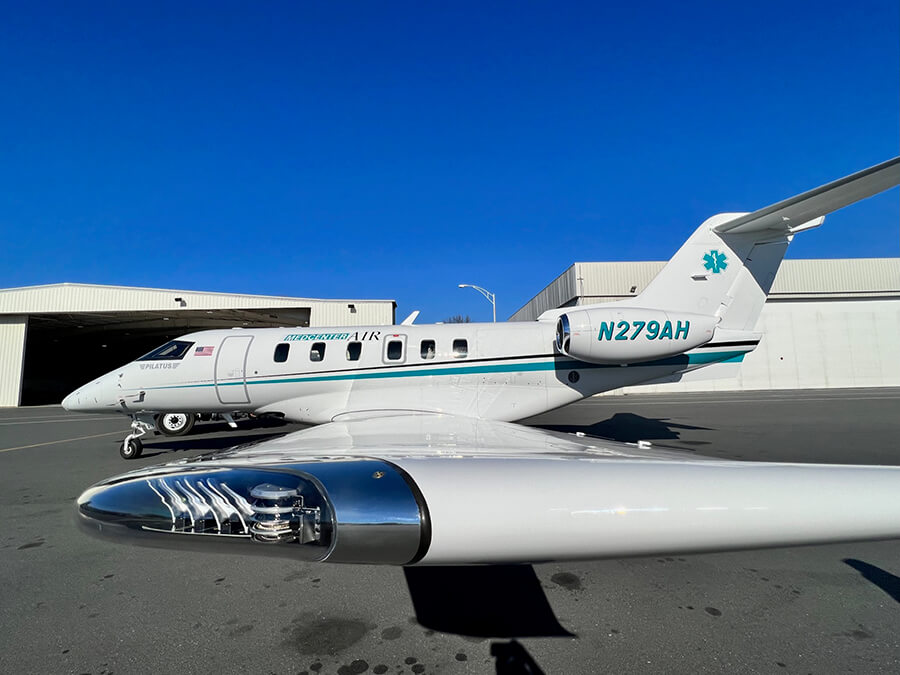 Wing of Pilatus PC-24 Med Center Airplane