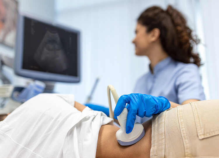 A medical professional giving an exam to a person.