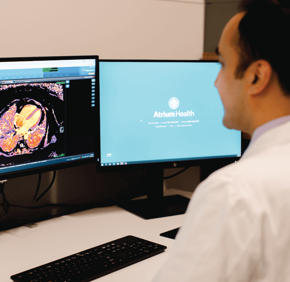 Provider looking at a computer screen.