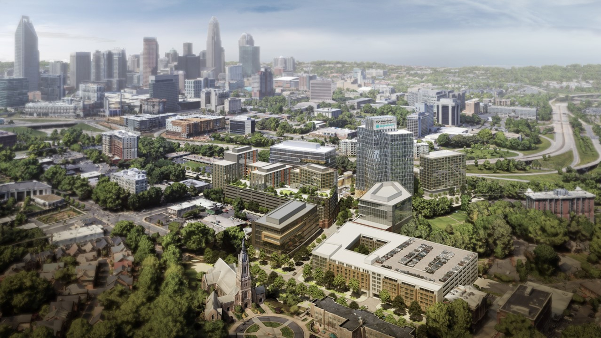 The image Woods revealed to the Charlotte Mecklenburg Housing Authority Board shows the future Charlotte campus of the Wake Forest School of Medicine as it sits in the heart of the Innovation District in the shadow of uptown Charlotte.