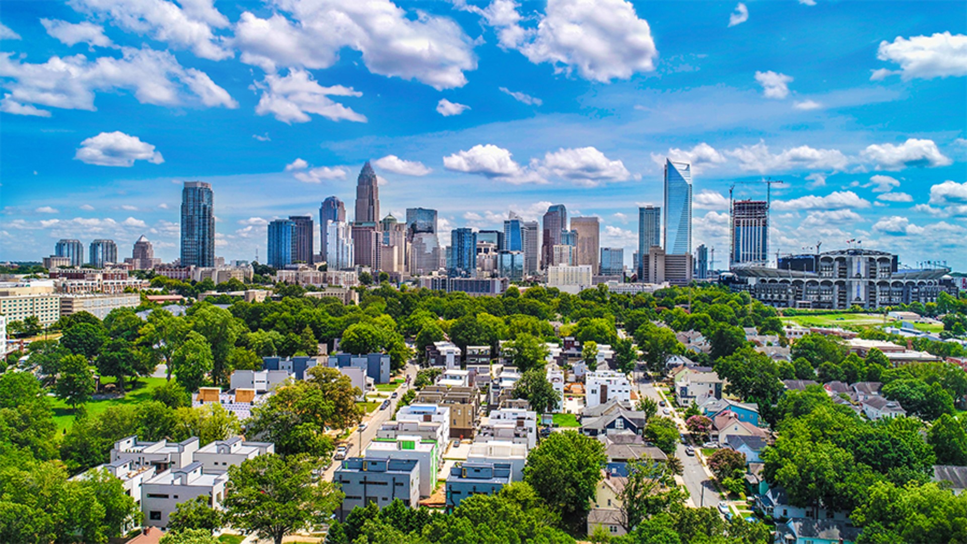 The skyline of Charlotte, NC, as a consortium of the public, private and non-profit sectors announce the launch of a comprehensive community-wide effort to create a strategic plan around housing instability and homelessness in the community. 