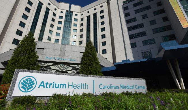 An exterior picture of a medical office, reading Atrium Health Carolinas Medical Center.
