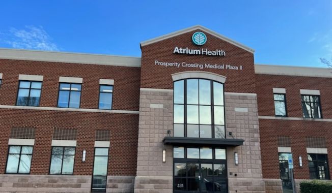 Photo of exterior large windows of Musculoskeletal Institute Sports Medicine Prosperity Crossing building.
