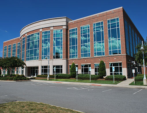 The outside of a Cabarrus College building on a sunny day.