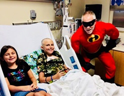 Patient Jacob with sister and Jeff as Mr. Incredible