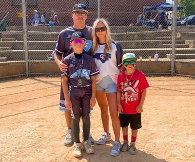 Brent Tidwell with his family at a baseball game.