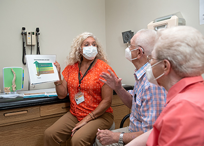 Anne Lake has a visit with Earl and Loutricia Redding.