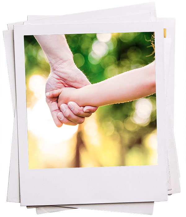 graphic made to look like stack of Polaroid photos with top one showing adult and child's hands.