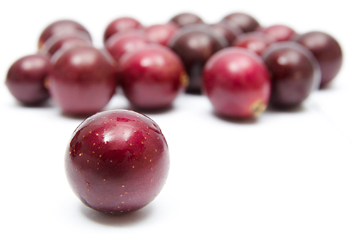 stock photo of loose grapes rolled out on surface