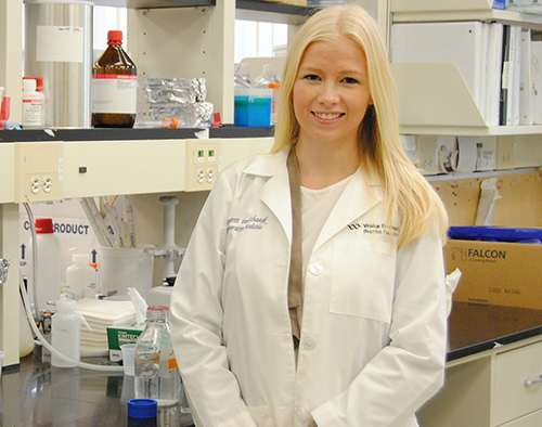 2017 Summer Scholar participant Margaret vanSchaayk, Wake Forest University, who presented her work on 3-D bioprinting of muscle tissue before Congress as part of a national showcase of undergraduate research, stands in lab