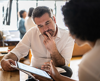 Man reviewing information with health provider
