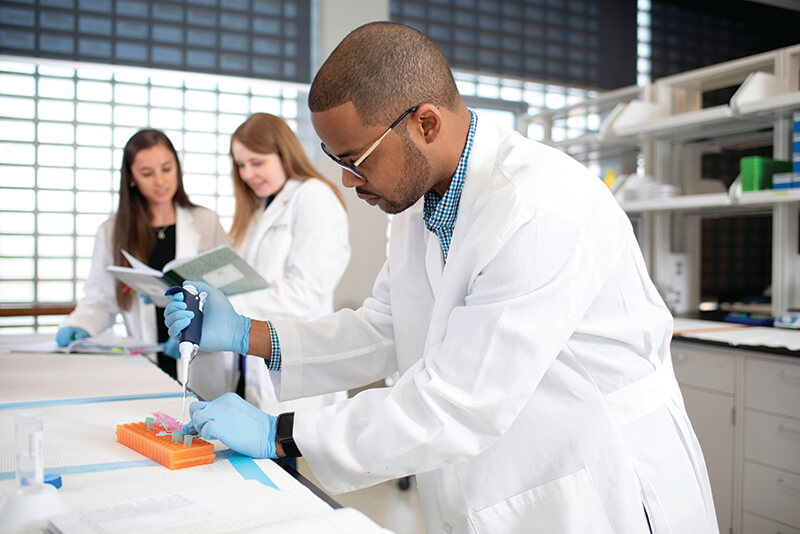 A medical professional conducting an experiment.