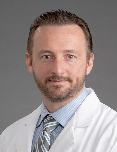 Adrian W. Laxton, MD