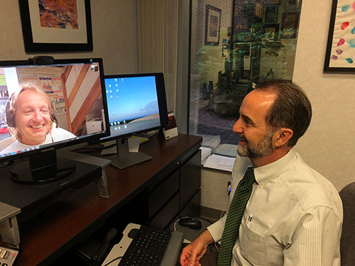 Co-investigators Anthony Bleyer, M.D., (right) Wake Forest School of Medicine and Stanislav Kmoch, Ph.D., (left) First Faculty of Medicine, Charles University, Prague, Czech Republic use internet communication to effectively collaborate on the research. The use of the internet calls and express shipping played a key role in bringing the scientists, clinicians and patients together virtually. 