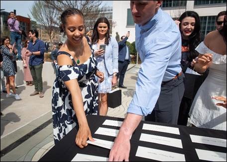 Wake Forest University School of Medicine medical students retrieve their envelopes at last year’s Match Day. 