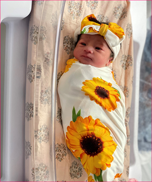 Mia Camila Mendez in sunflower wrap.