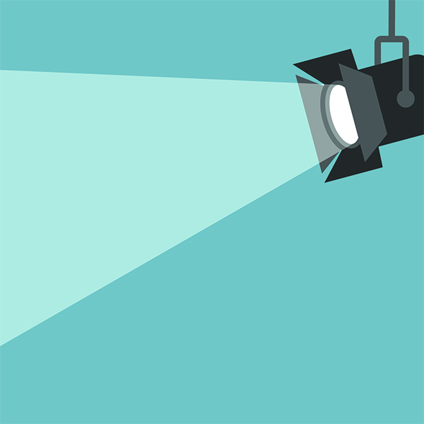 Illustration of a black stage spotlight on the left beaming a white ray of light toward the right, on a blue background