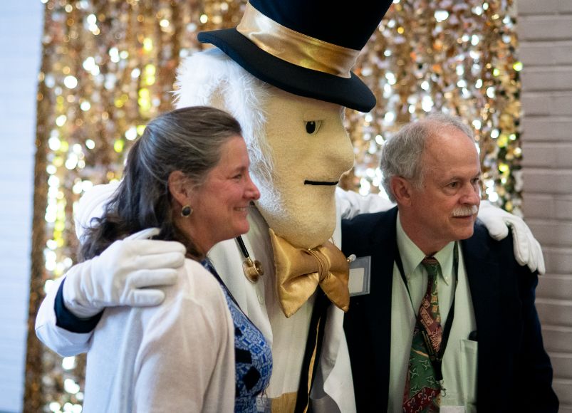 Photo of Dr. McMichael receiving an award at Alumni Weekend 2023 at Wake Forest University School of Medicine.