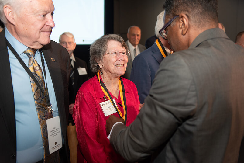 Alumni talk and are recognized at the 2024 Alumni Weekend.