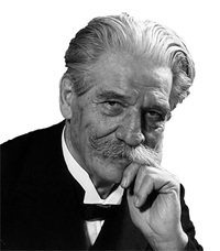 Black and white image of smiling Albert Schweitzer (1875-1965) in his later years