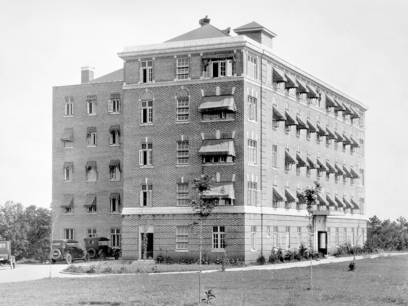 A black and white photo of a medical office building.