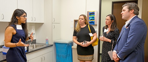 School of Medicine students lead tours of the DEAC Clinic's new location during an open house