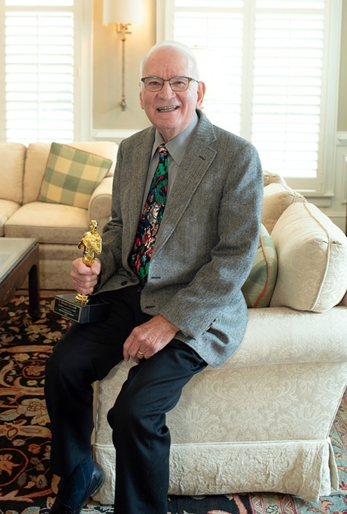 C. Douglas Maynard, MD ’59, poses with his Emeritus Academy Award