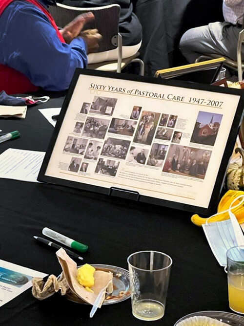 A plaque with pictures that reads Sixty Years of Pastoral Care 1947 - 2007.