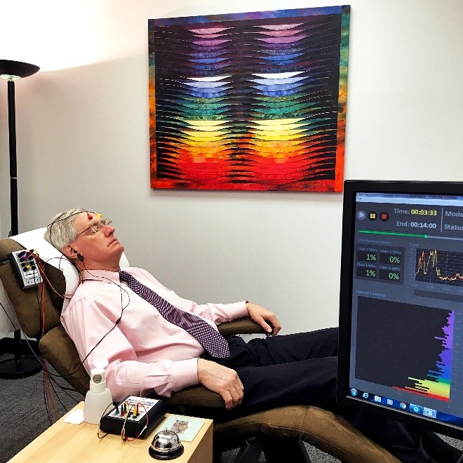 Dr. Tegeler in session for HIRREM research. 