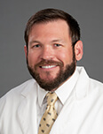 Cody Cox, MD.