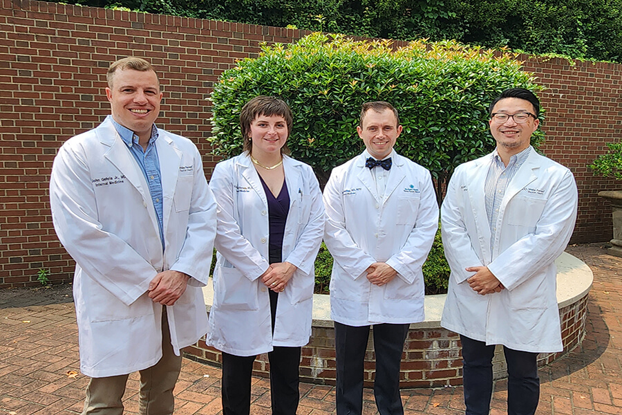 (left to right): John Gehris, MD; Andy Anderson, MD; John Hunting, MD; and Ted Xiao, MD