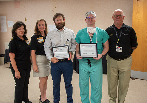 Chris Davis (Left) and Jerry Clark (Right) win Educator of the year awards for CEAL.