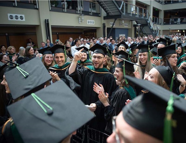Wake PA Class of 2019 graduates smile and talk after ceremony