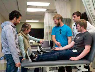 PA students experiment with ultrasound techniques on each other