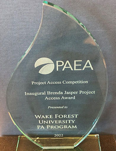 An award made of glass from the Physician Assistant Education Association (PAEA).
