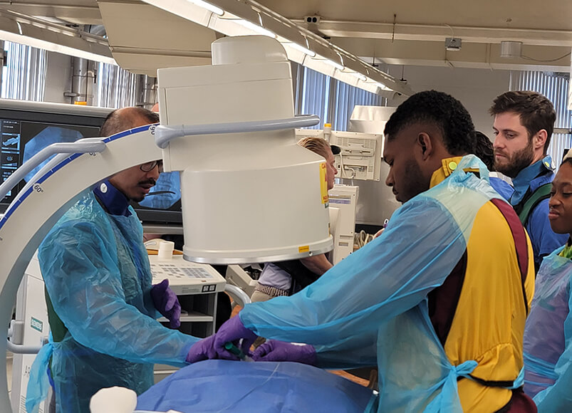 Dr. Chris Trower practicing Spinal Cord Stimulator Needle Placement using an anatomy model